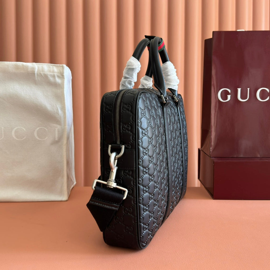 GUCCI 26S EMBLEM DUFFLE BAG 38 IN BLACK EMBOSSED CALFSKIN